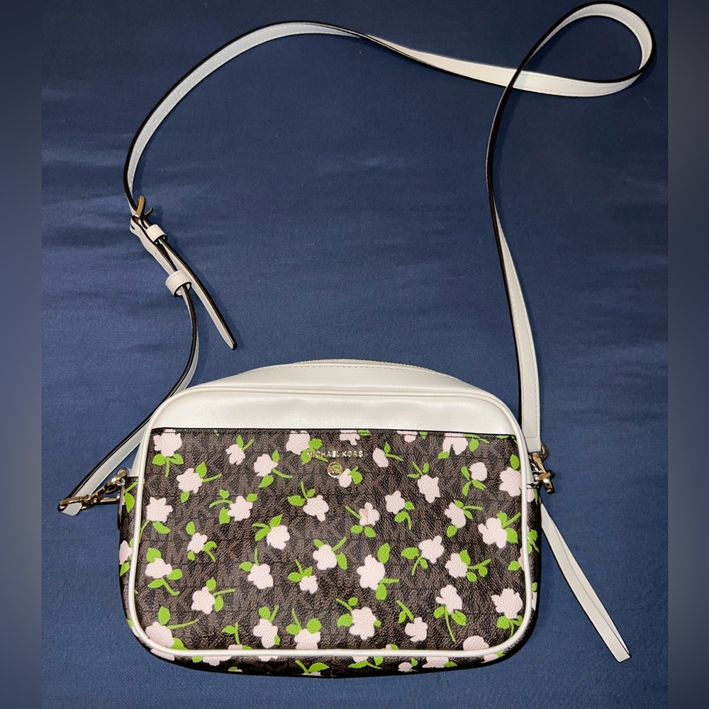 Michael Kors floral crossbody. Like new, no rips, no stains, hardly ever used.